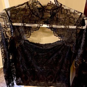Sheer lace black top by Guess. Never worn like new.